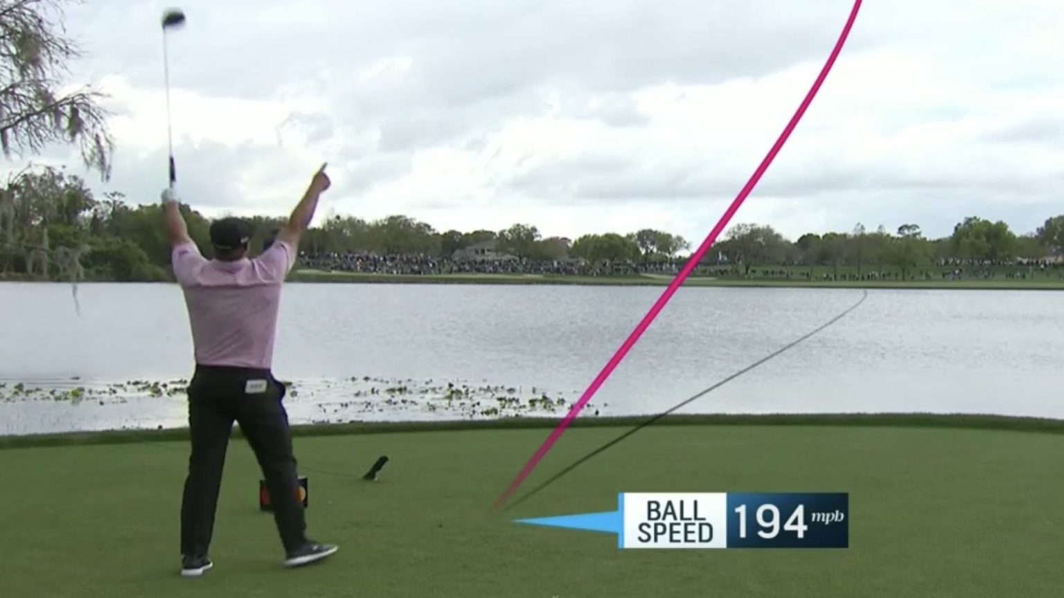 Bryson DeChambeau celebrates nearly driving the 6th hole at Bay Hill in